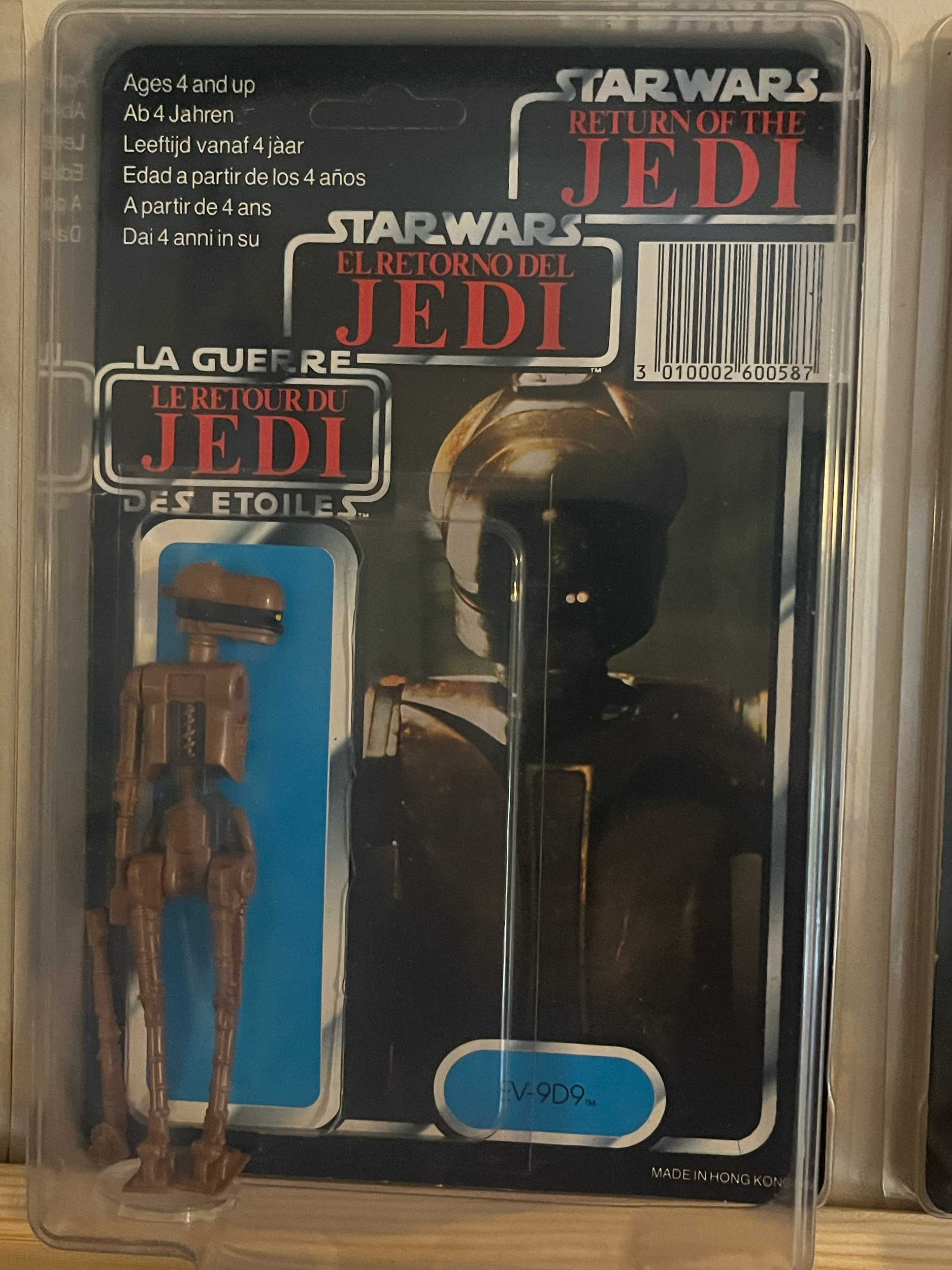 A packaged action figure from the TV series 'The Walking Dead', featuring Negan, inside a plastic case with branding and product information.