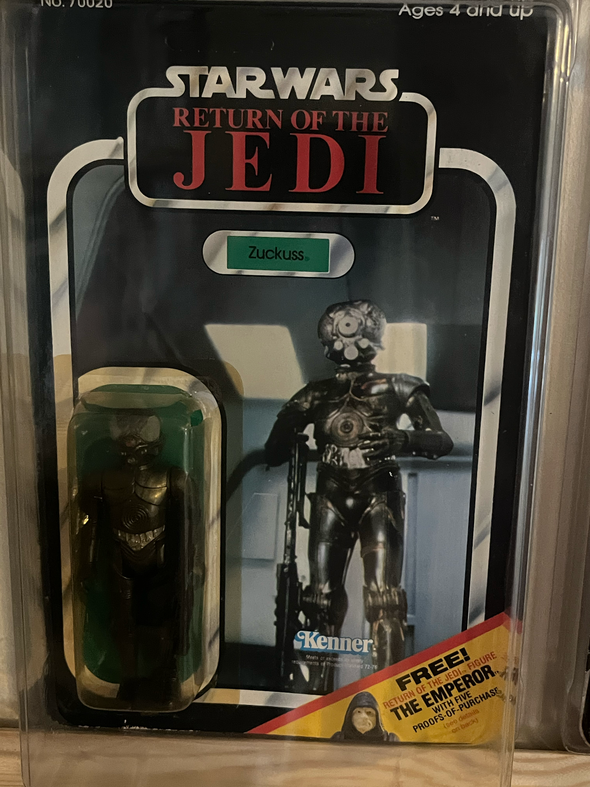 A box of 'MIKE THE FISHER' themed trading cards or collectibles featuring a skeleton fisherman figure. The packaging has a black background with large white and red text and a prominent image of the skeleton figure.