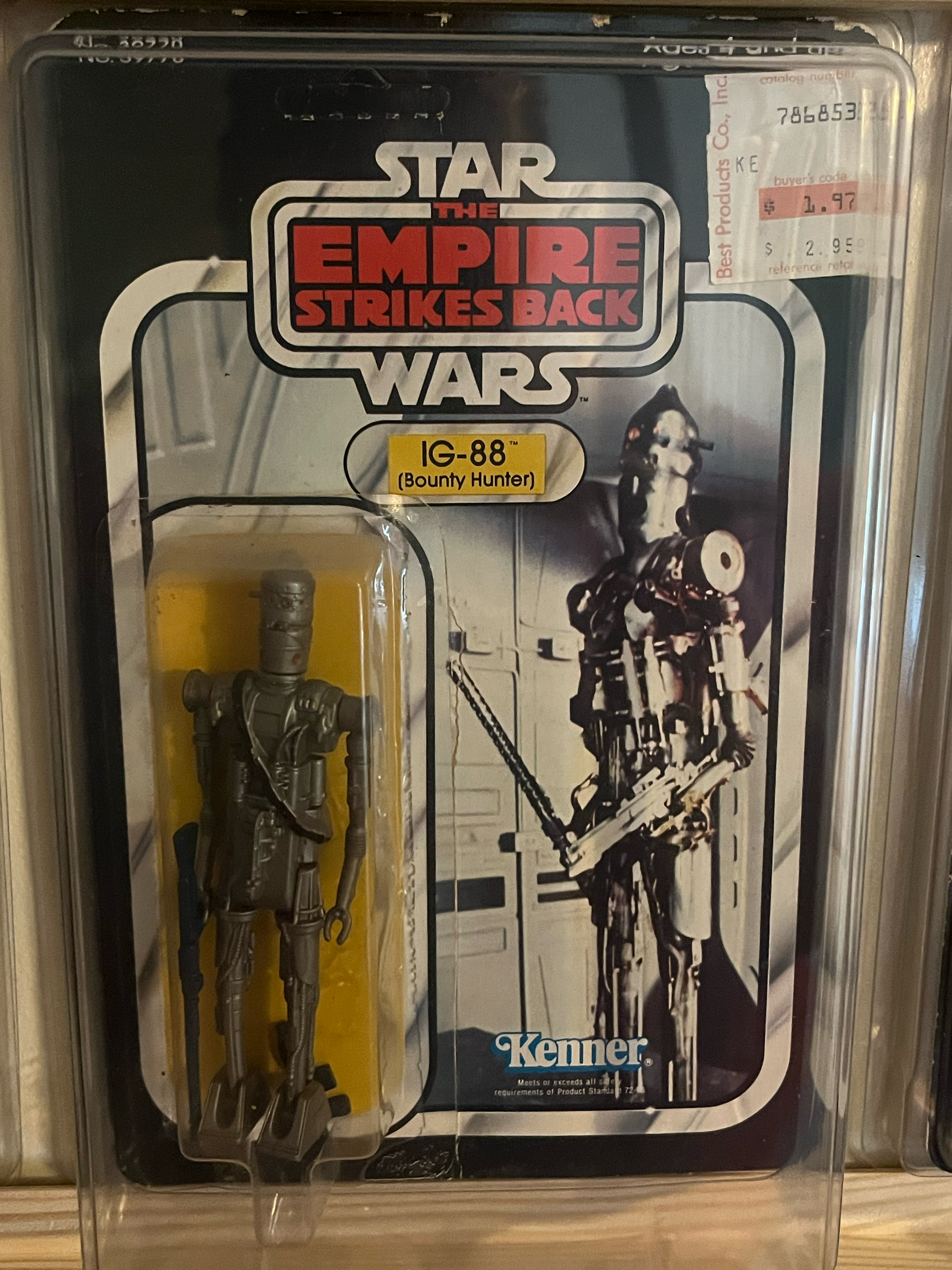 Star Wars: The Empire Strikes Back action figure set in original packaging, featuring a robot character and accessories.