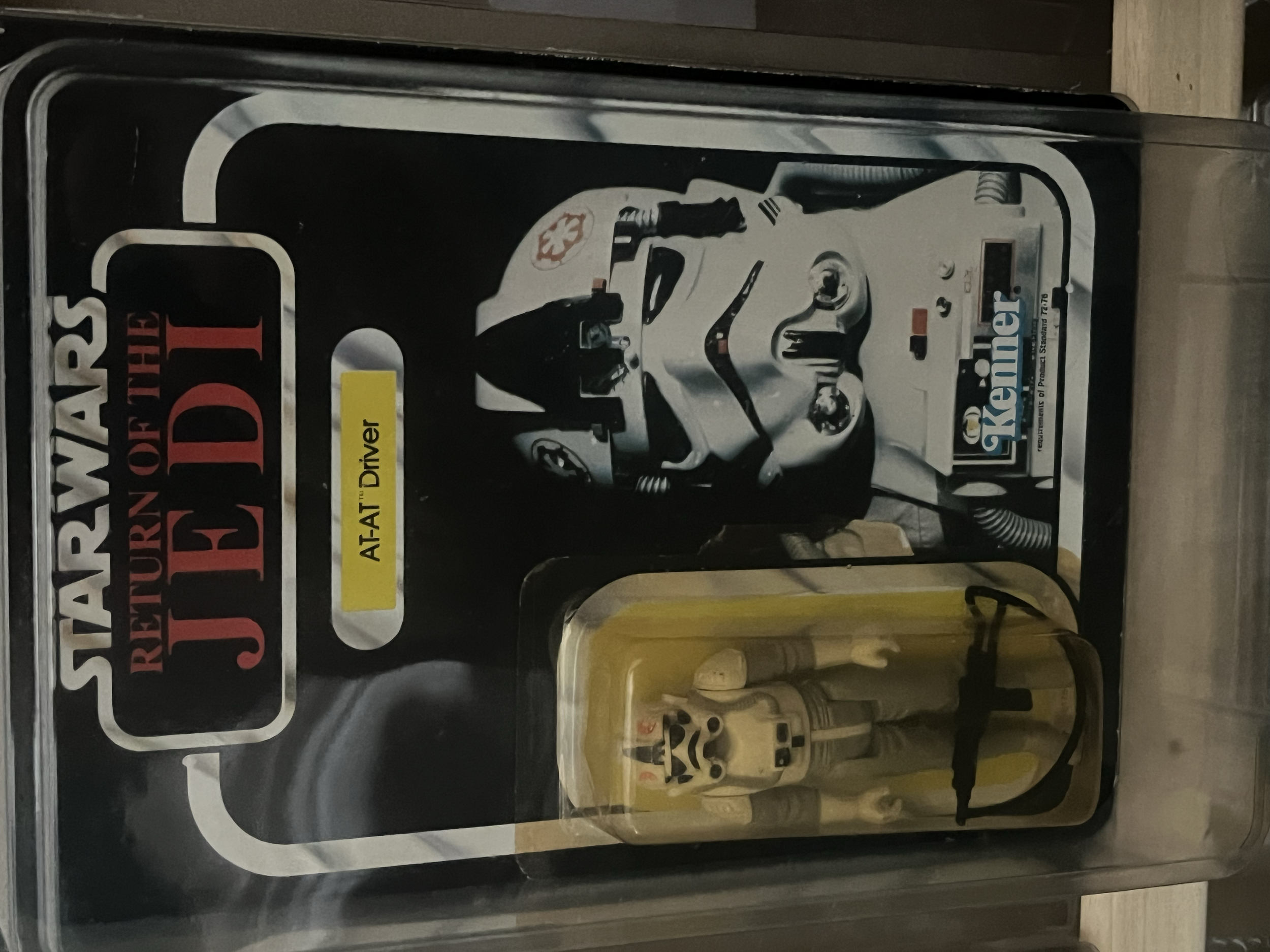 A vending machine with a sticker that reads 'TRUST YOURSELF' and an illustration of a stormtrooper from Star Wars.
