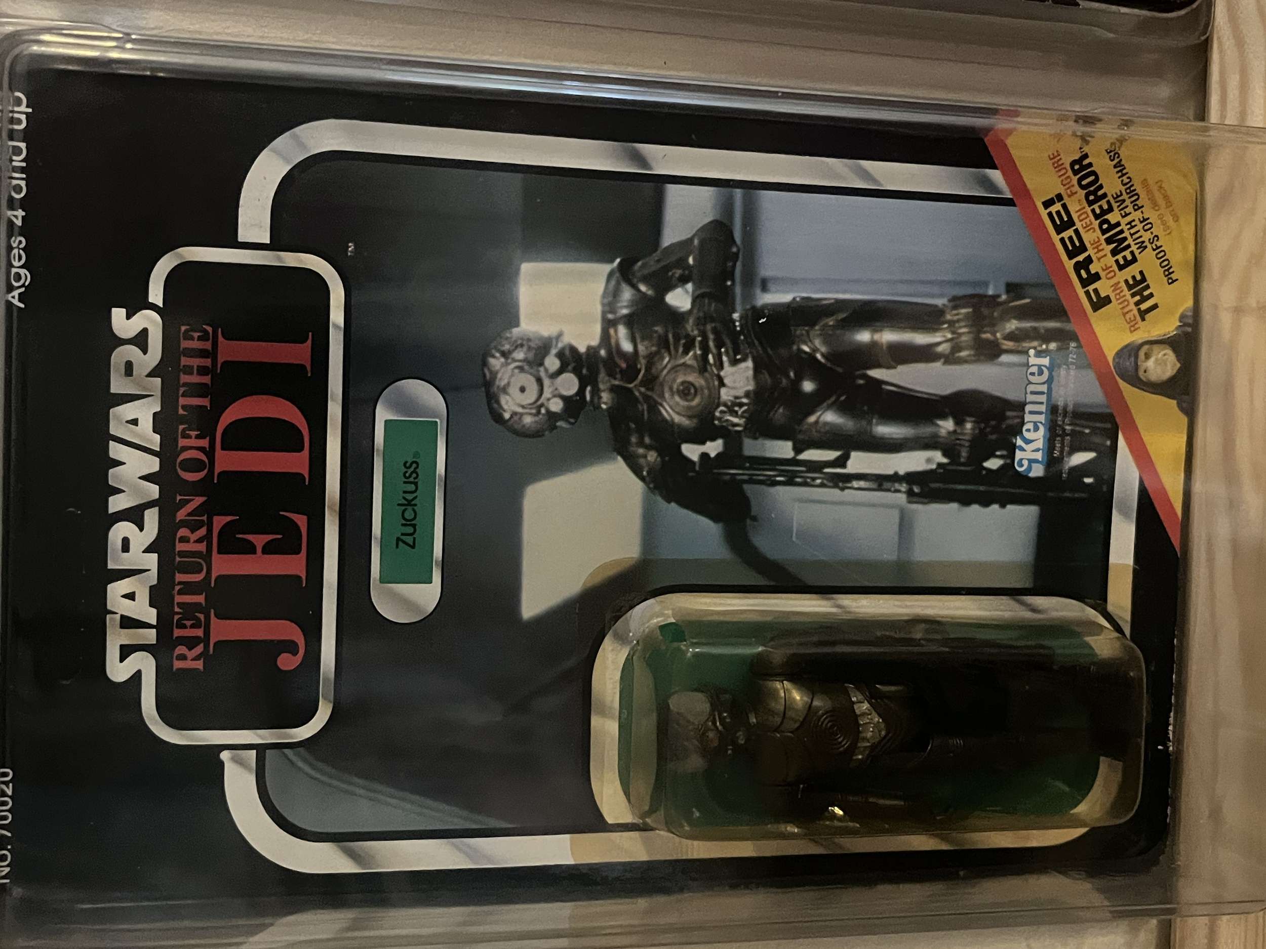 A box of 'MIKE THE FISHER' themed trading cards or collectibles featuring a skeleton fisherman figure. The packaging has a black background with large white and red text and a prominent image of the skeleton figure.