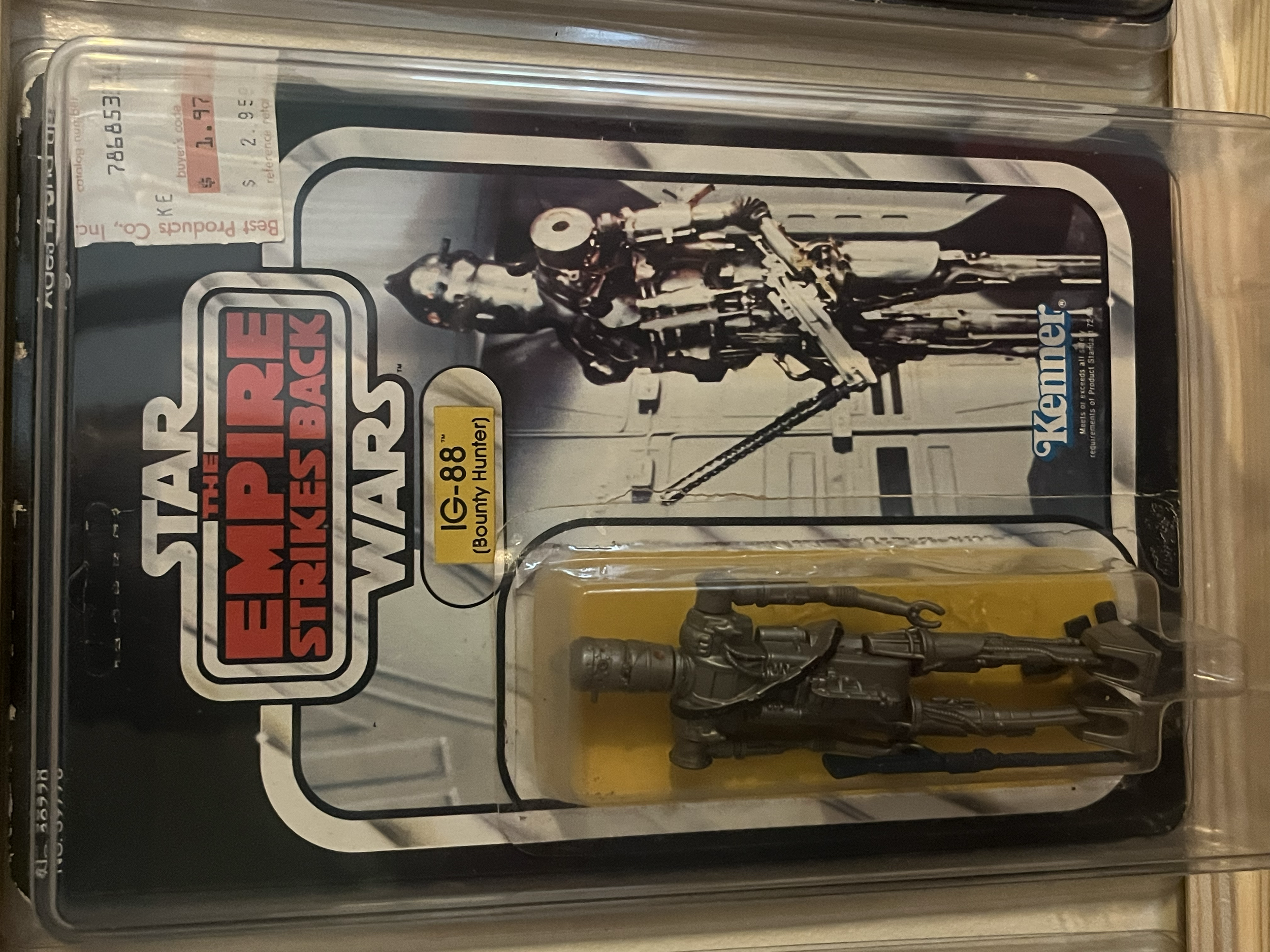 Star Wars: The Empire Strikes Back action figure set in original packaging, featuring a robot character and accessories.