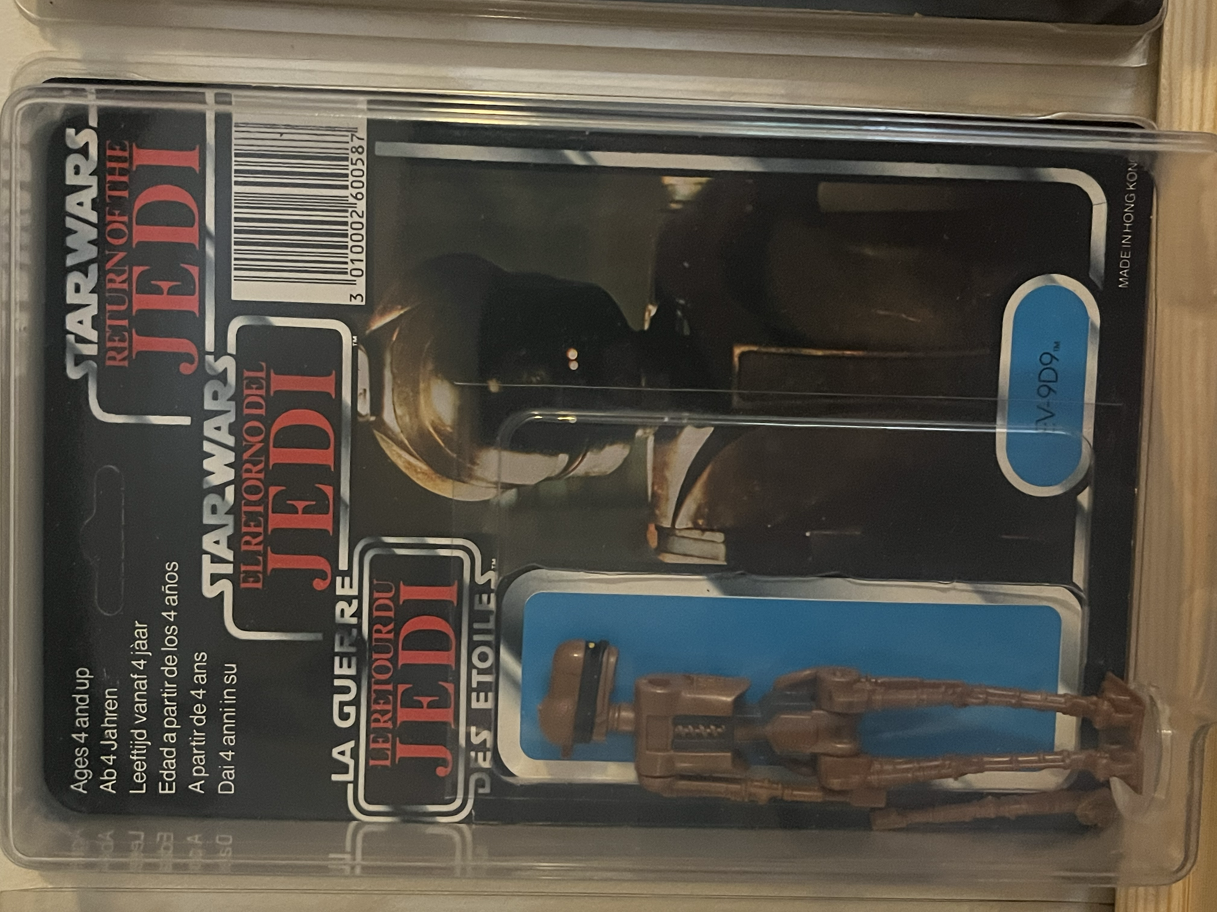 A packaged action figure from the TV series 'The Walking Dead', featuring Negan, inside a plastic case with branding and product information.