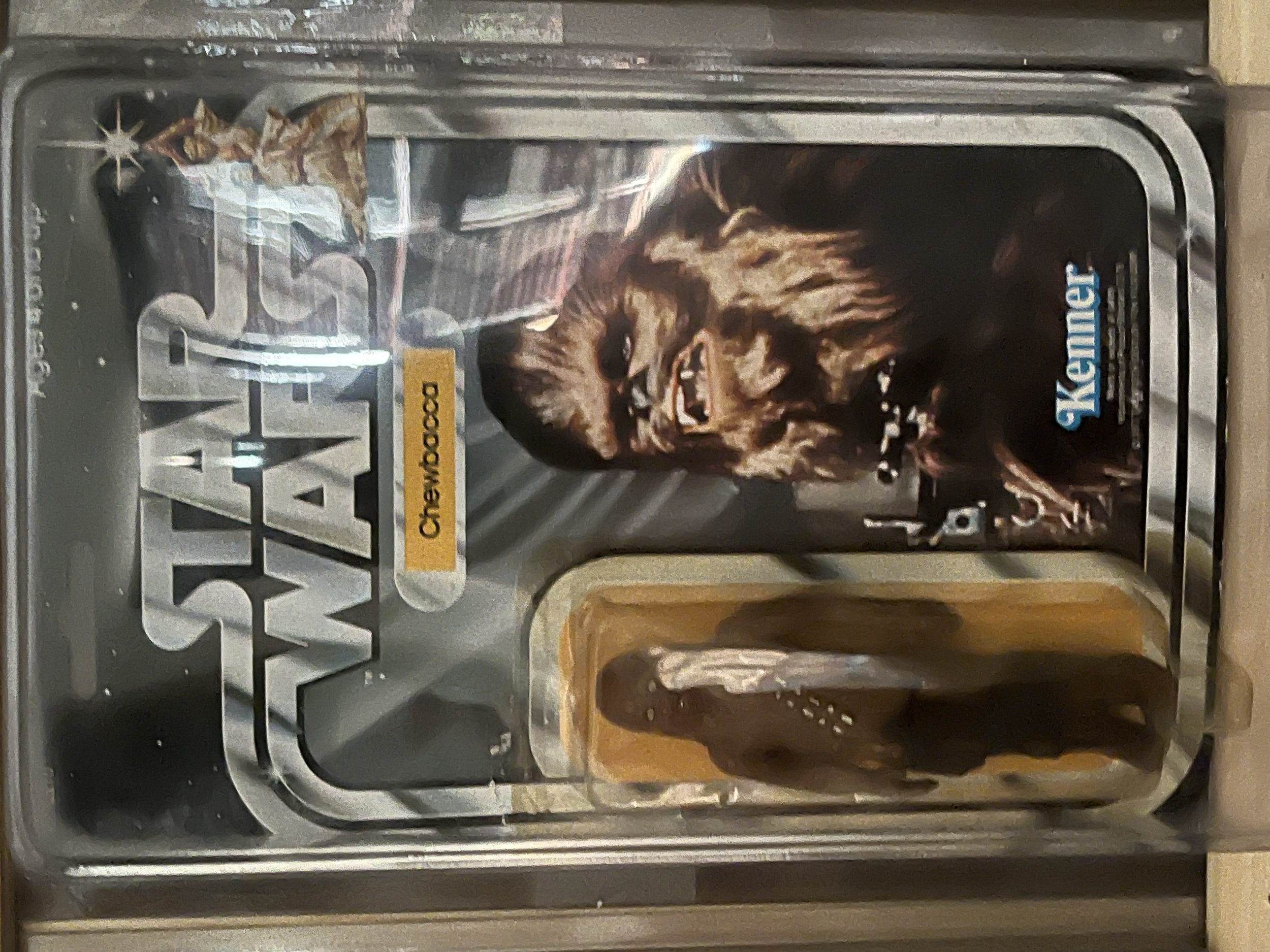 A vending machine with a Marvel-themed design featuring the character Wolverine. It contains ice packs shaped like Wolverine's claws and other Marvel memorabilia.