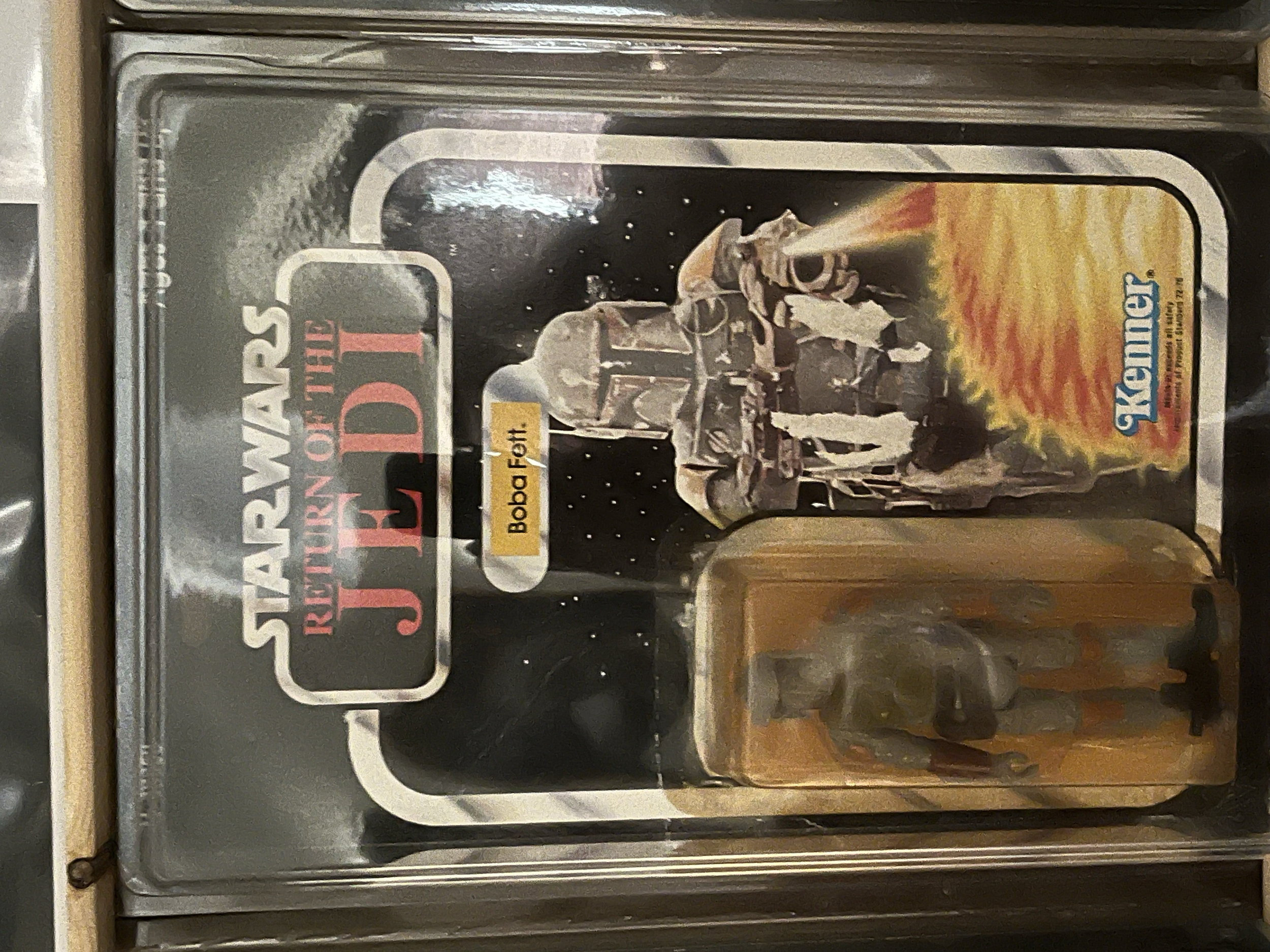 A sealed package of Star Wars The Empire Strikes Back action figures from Burger King. The package contains a Boba Fett figure and is labeled 'Star Wars The Empire Strikes Back' with a background of space and a starship.