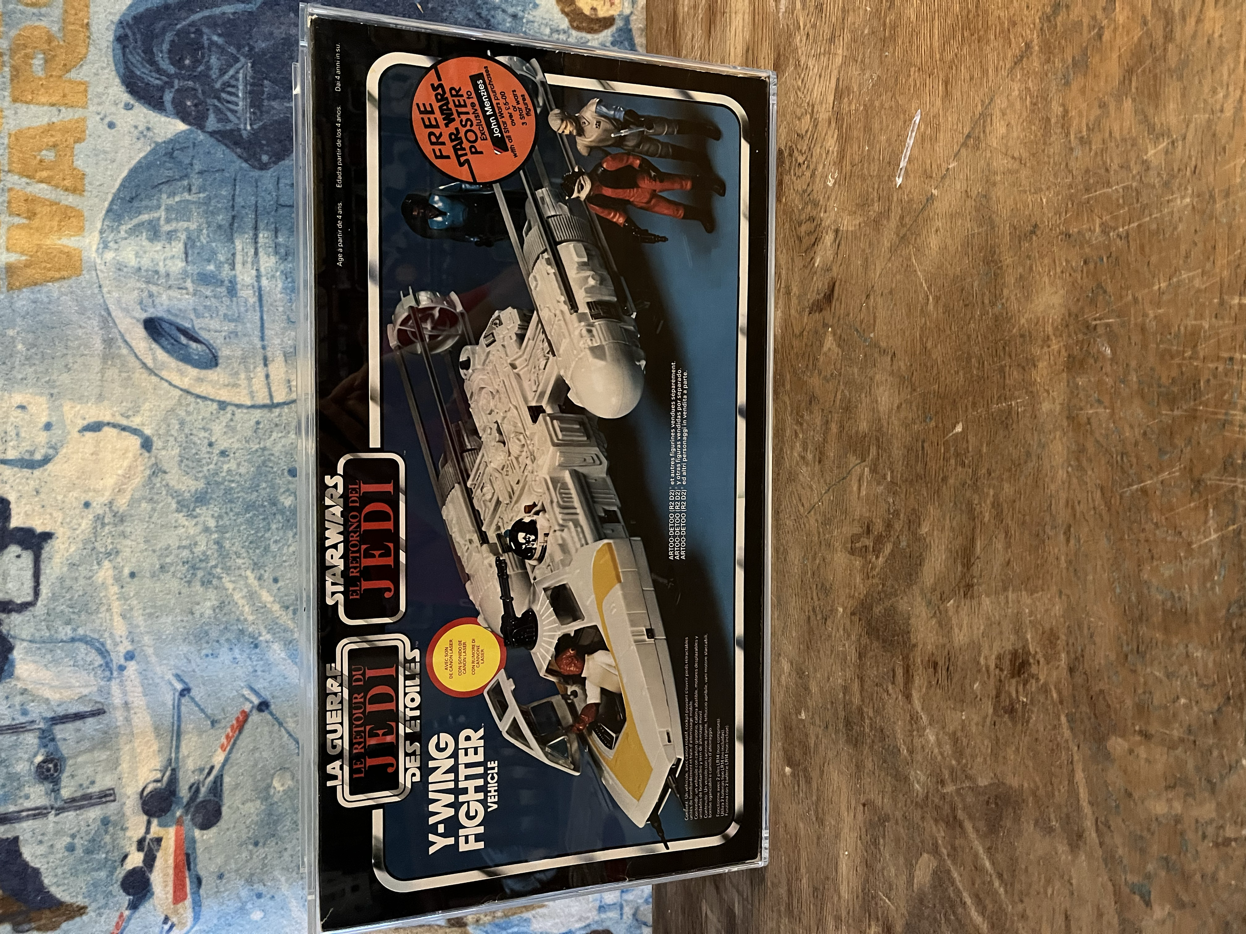 A toy set featuring a Star Wars vehicle, specifically the Rebel Snow Speeder, with multiple action figures in the packaging. The box displays an image of the vehicle and characters from Star Wars.