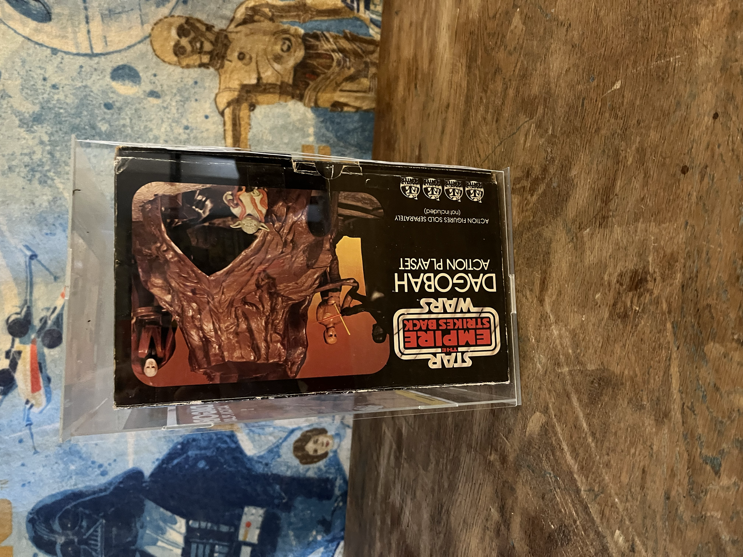 A boxed copy of the Star Wars War of the Bounty Hunters comic titled 'Darth Vader' with a cover illustration of Darth Vader and Boba Fett.