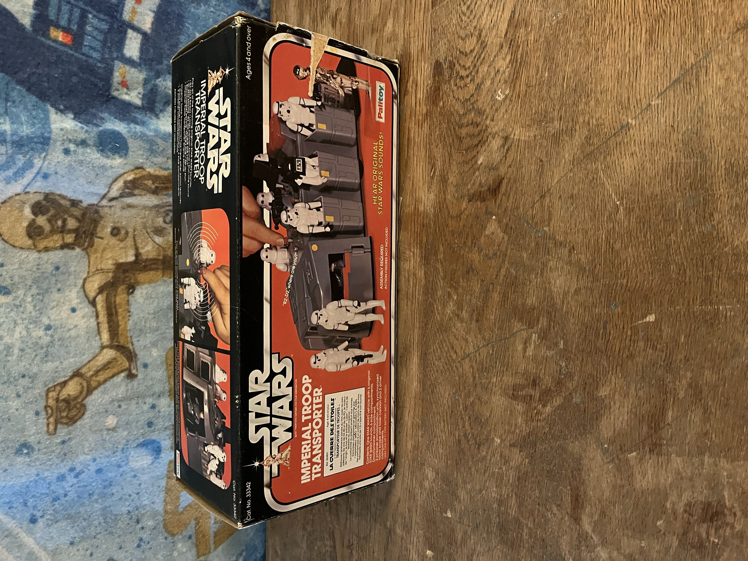 Star Wars original trilogy portable electronic game box featuring characters and scenes from the Star Wars universe, with a red and black color scheme and branding logo.