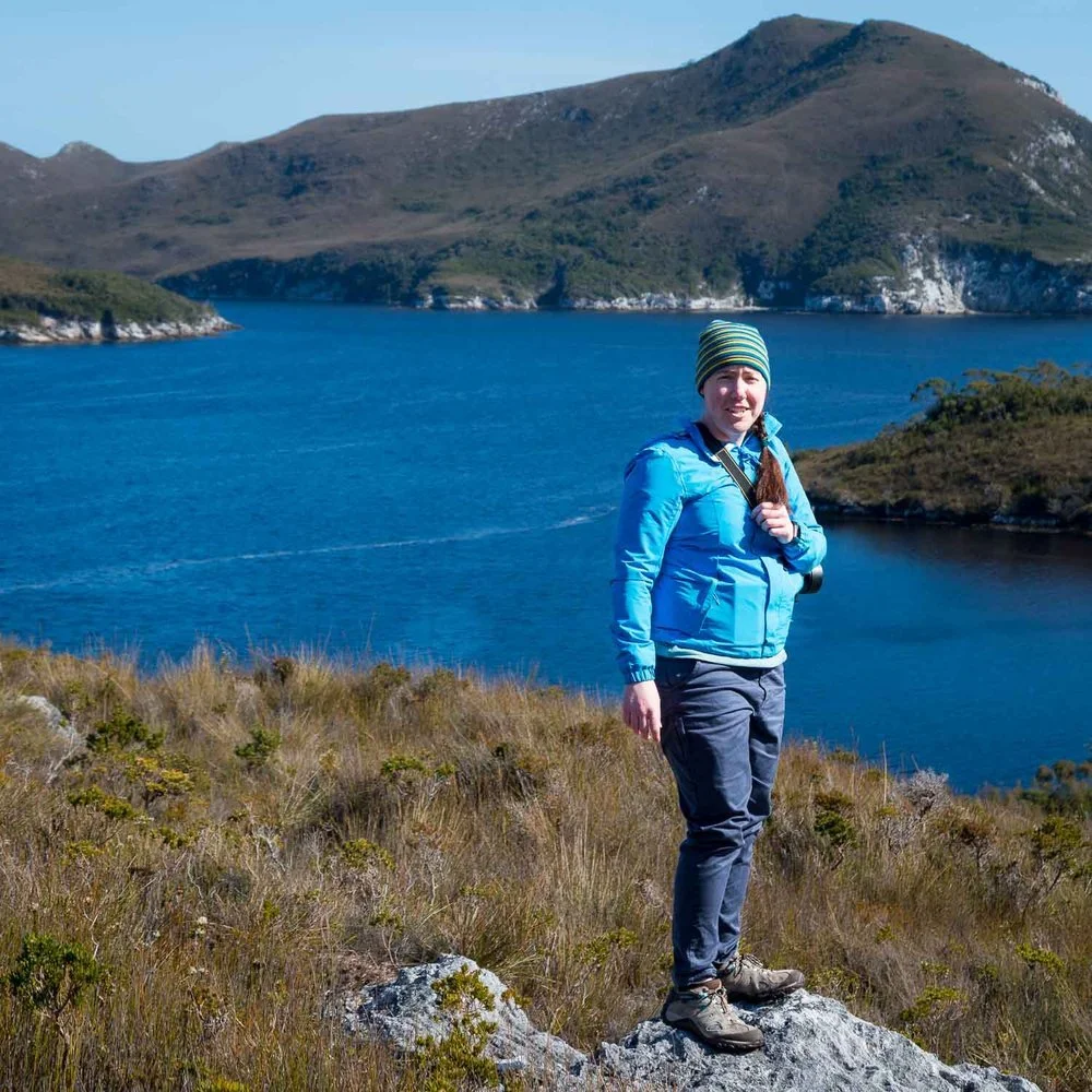 person standing in the southwest national park tasmania