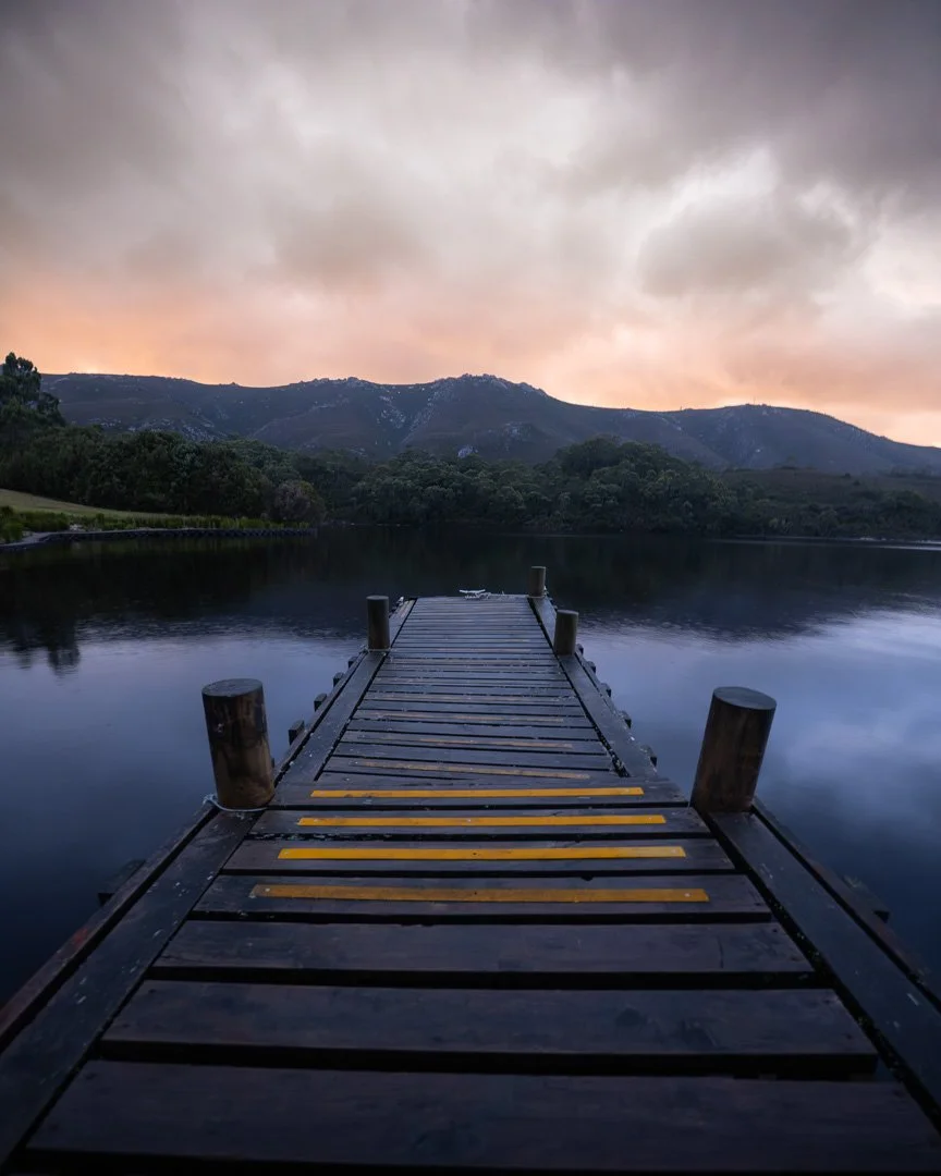 Sunrise from the jetty on the water in Southwest Tasmania