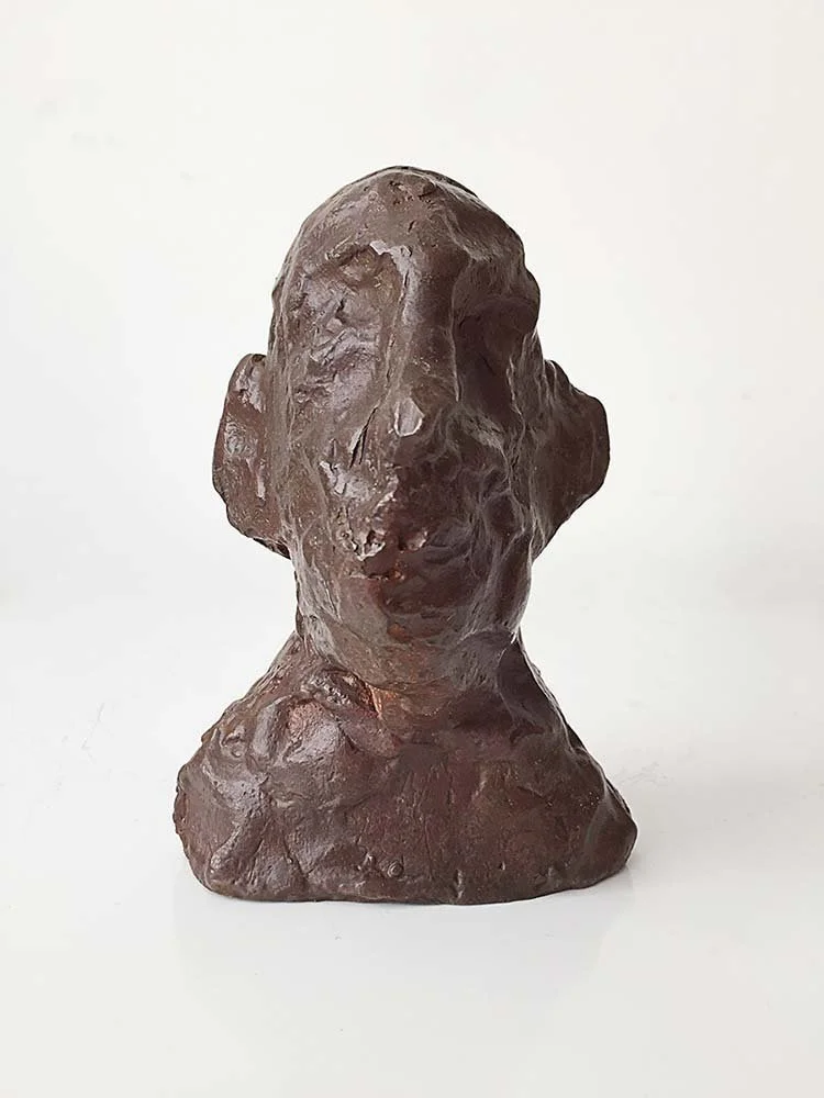 A bronze sculpture of a person's bust, 12 cm, 2015