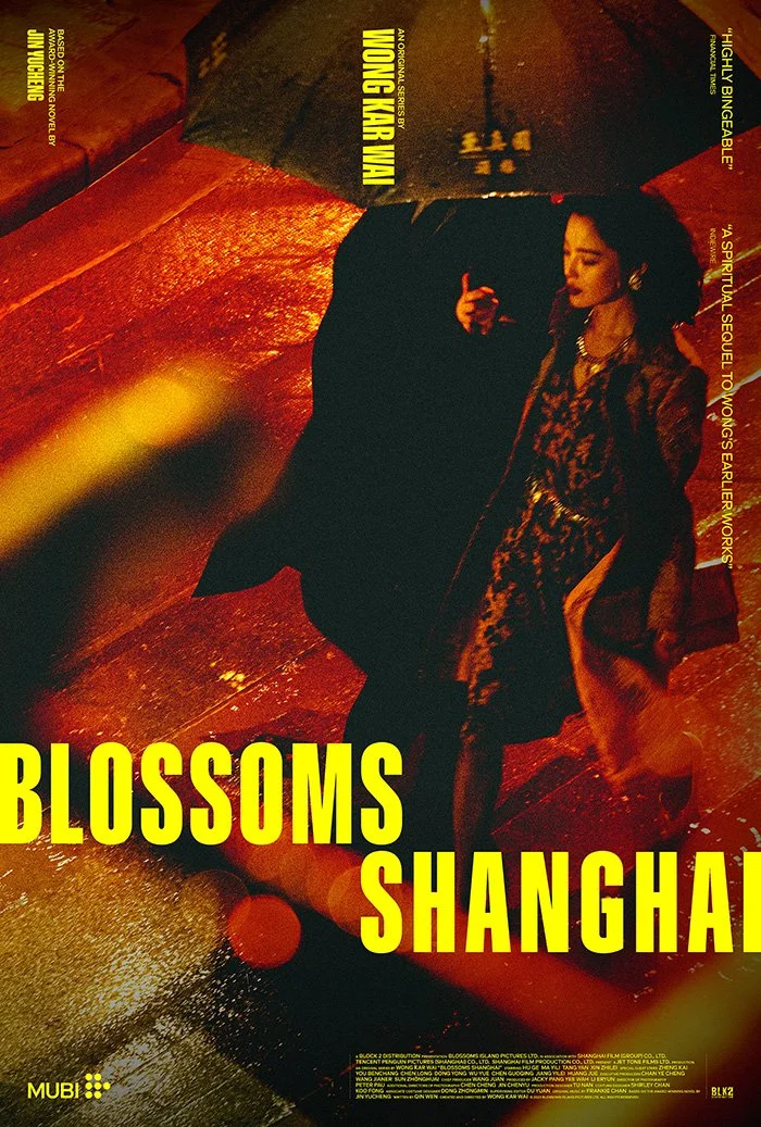 Movie poster for 'Blossoms Shanghai', Wong Kar Wai's first TV series, of a couple walking on a wet street at night with reflections of lights, holding an umbrella, with yellow and orange tones and text including the title and reviews.
