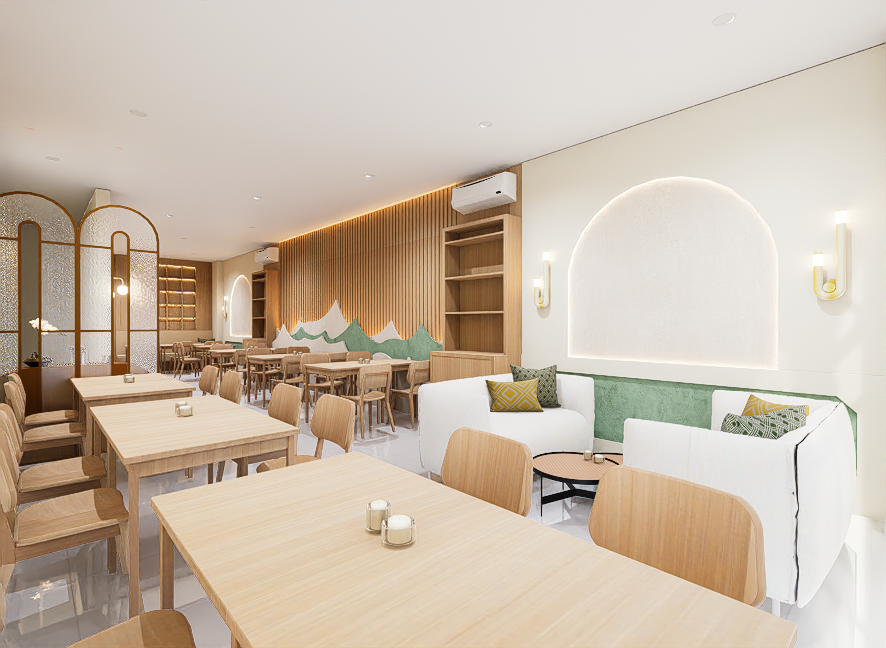 Bright, modern restaurant interior with light wood furniture, white walls, and green accents. There are tables and chairs, with a white sofa and decorative pillows, illuminated by wall sconces.