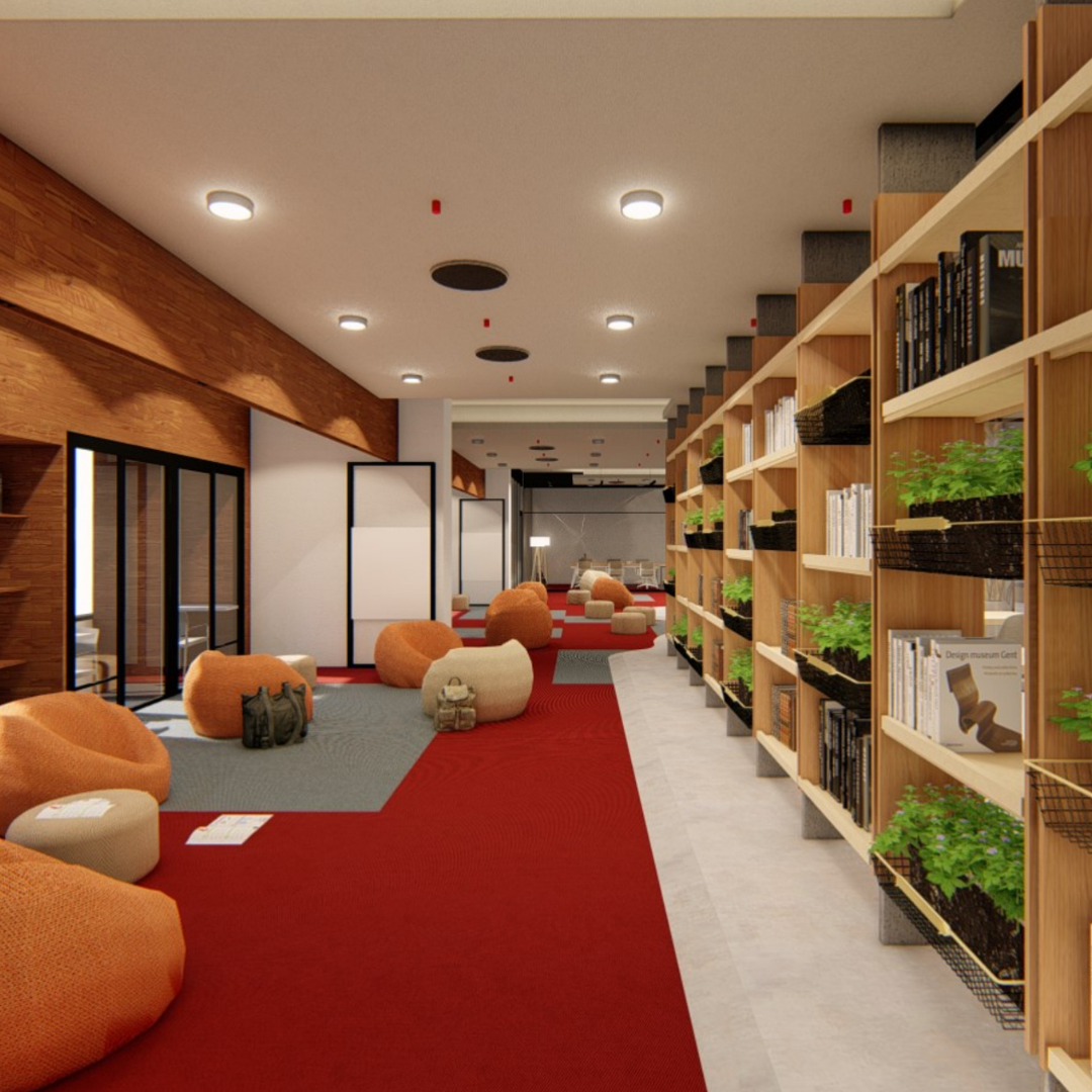 Modern library or lounge area with orange and beige bean bag chairs, a red and gray carpet, wooden bookshelves with books and plants, and a seating area in the background.