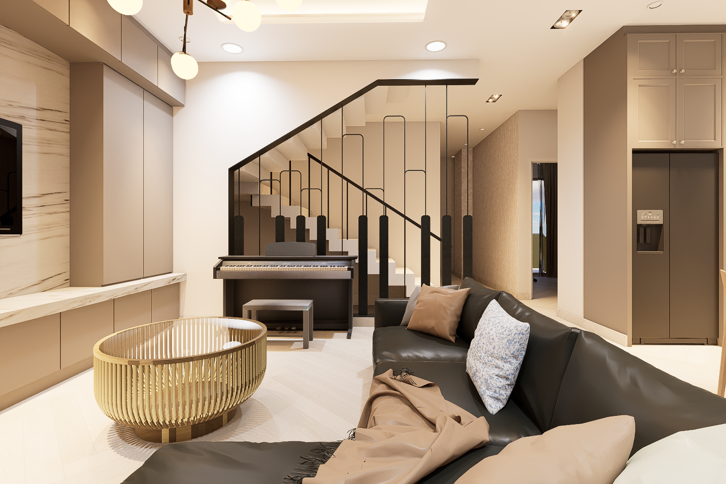 Modern living room with a black leather couch, pillows, a gold coffee table, a digital piano, staircase, and built-in cabinets.