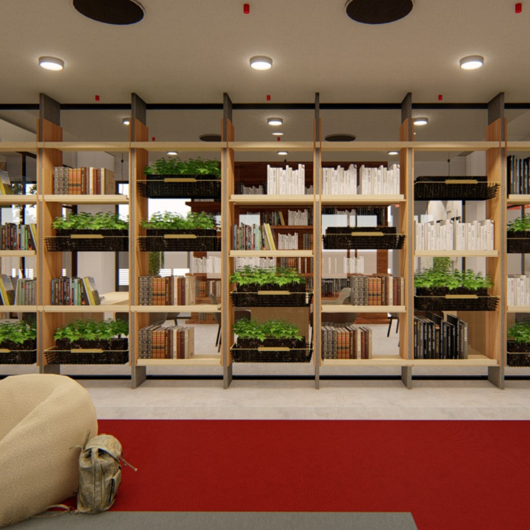 Bookshelf with plants and books in a modern library or office space.