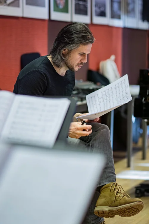 Ülo Krigul studying a musical score