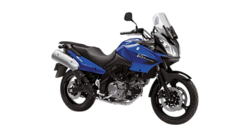 A blue and black Honda VFR motorcycle with a windshield and dual exhaust pipes.