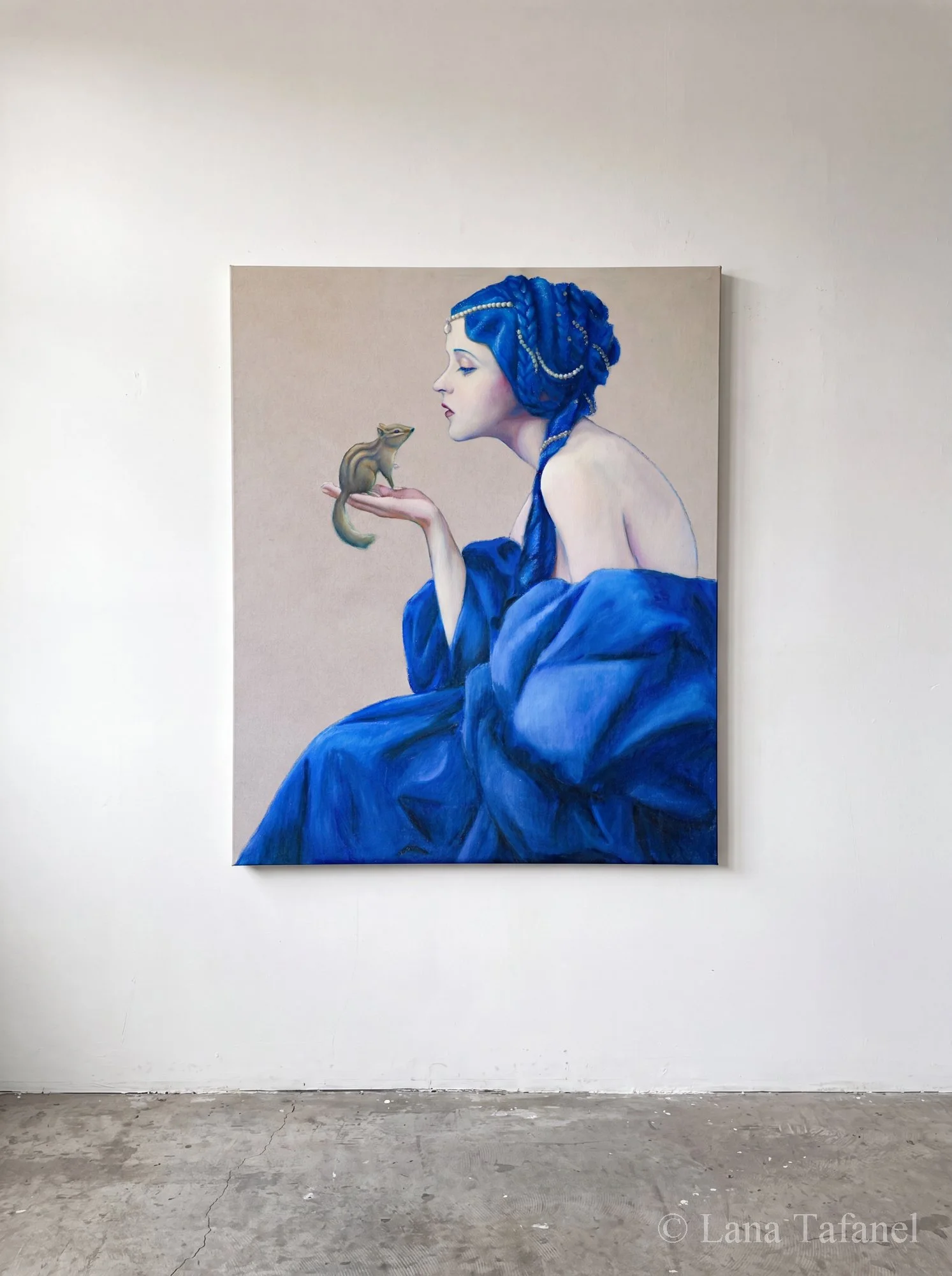 Painting of a woman with blue hair adorned with pearls holding a hamster on her finger, displayed on a gallery wall.