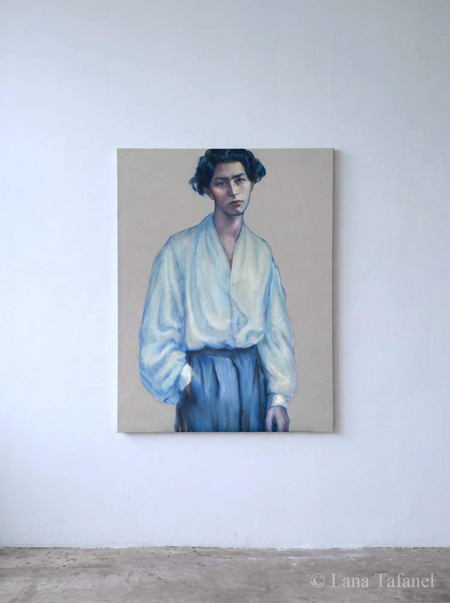 A painting on the gallery wall of a man with short curly dark blue hair, wearing a white shirt with bell sleeves and black pants, standing against a neutral background. 
