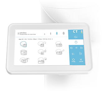 A medical monitor with icons indicating different breathing therapy modes, and a white pillow in the background.