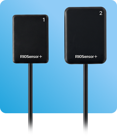 Two black RIOSensor+ devices labeled 1 and 2, connected by cables, on a light blue background.