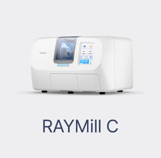 A RAYMIll C machine used for medical imaging, with a digital interface and a transparent cover showing a scanner inside.