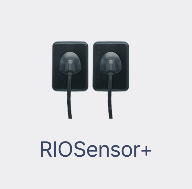 Two black electric power outlets with cords plugged in, and text that reads "RIOSensor+" underneath.