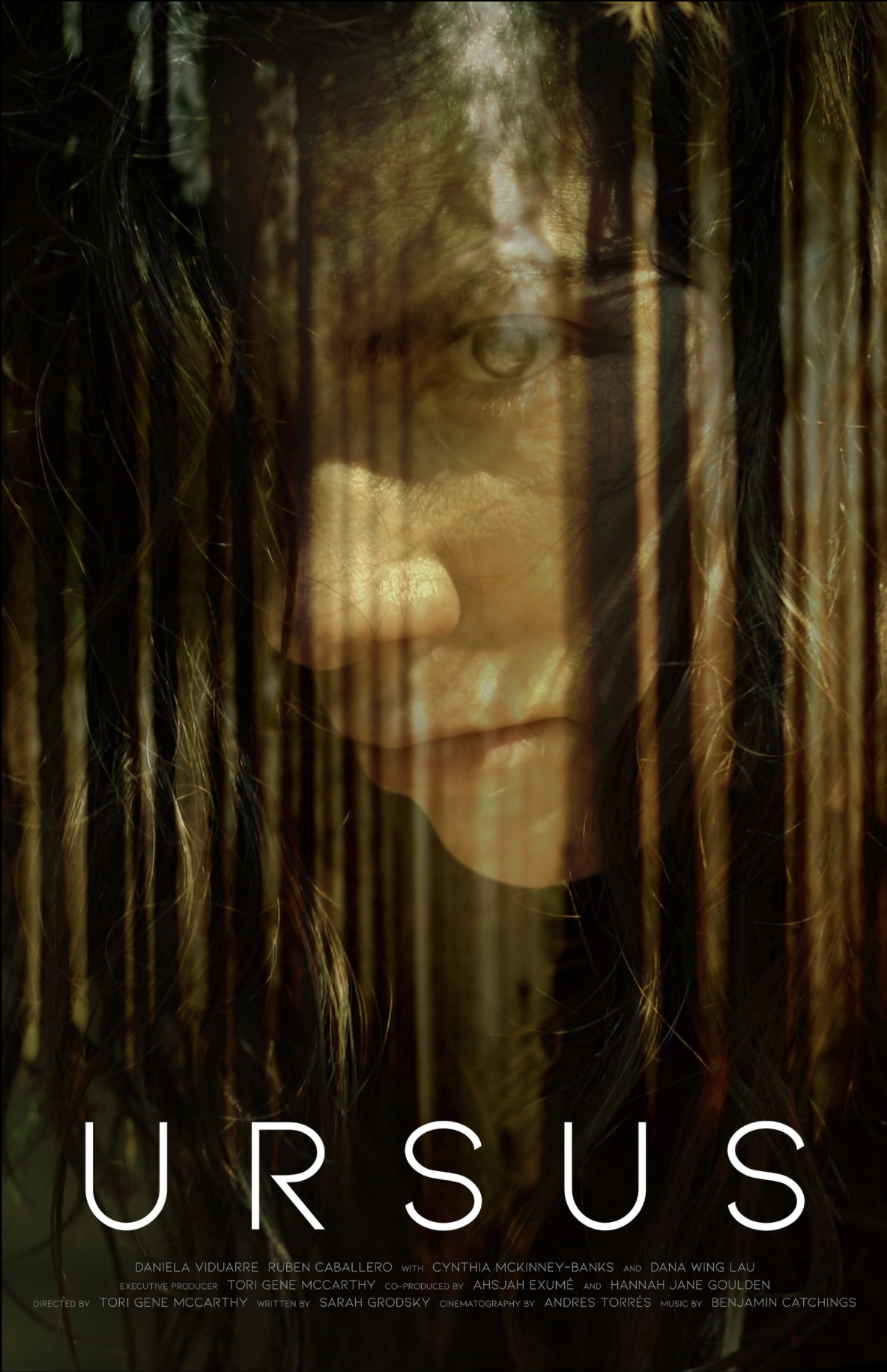 Close-up of a woman's face with wet hair, partially obscured by vertical lines, with the word 'UR SUS' at the bottom.