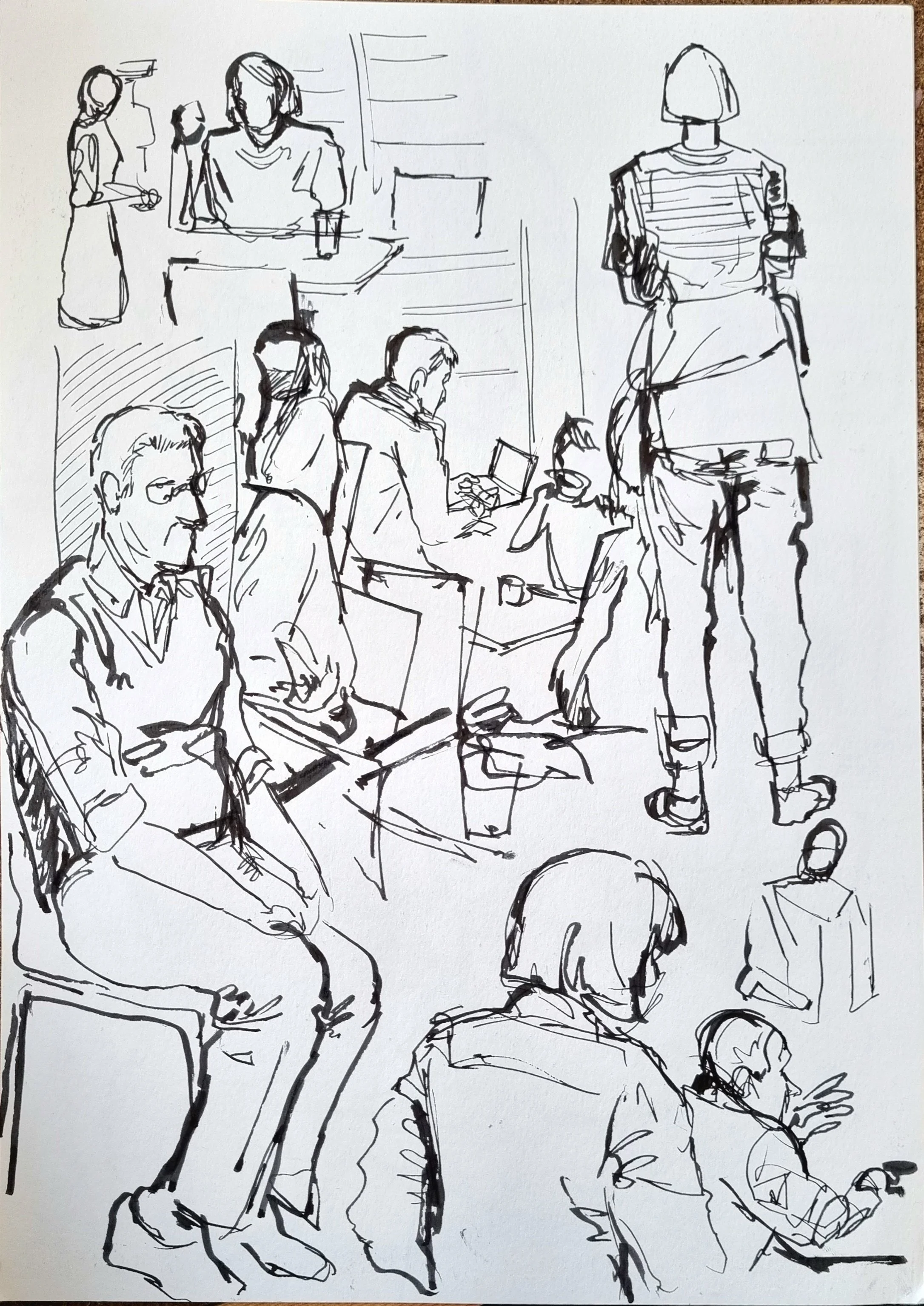 A black and white sketch of a busy indoor scene with multiple people. Some individuals are seated, others are standing, and one person appears to be talking or presenting. The background has abstract lines suggesting a modern setting, possibly an off