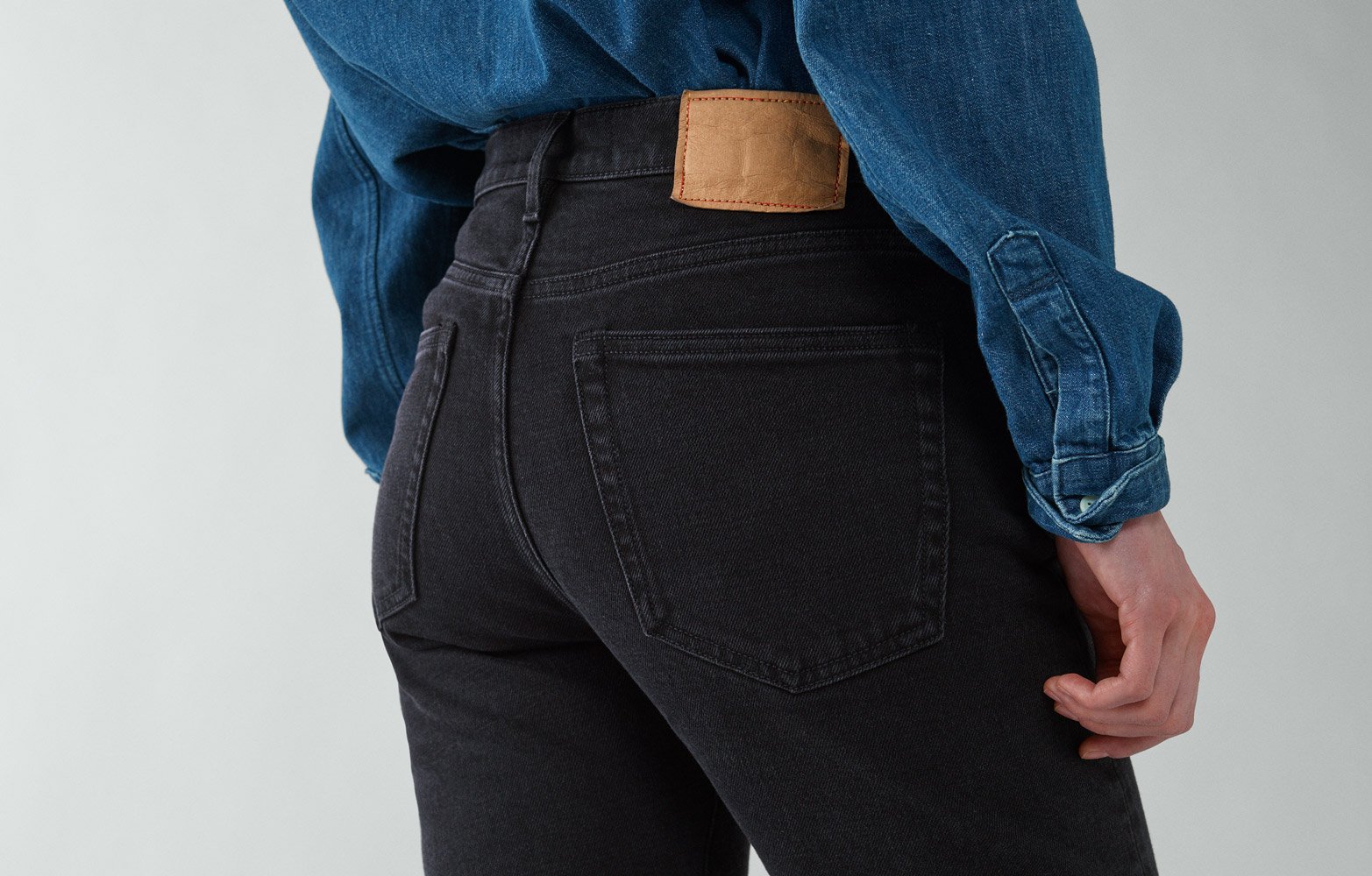 Jeanerica black jeans worn by model