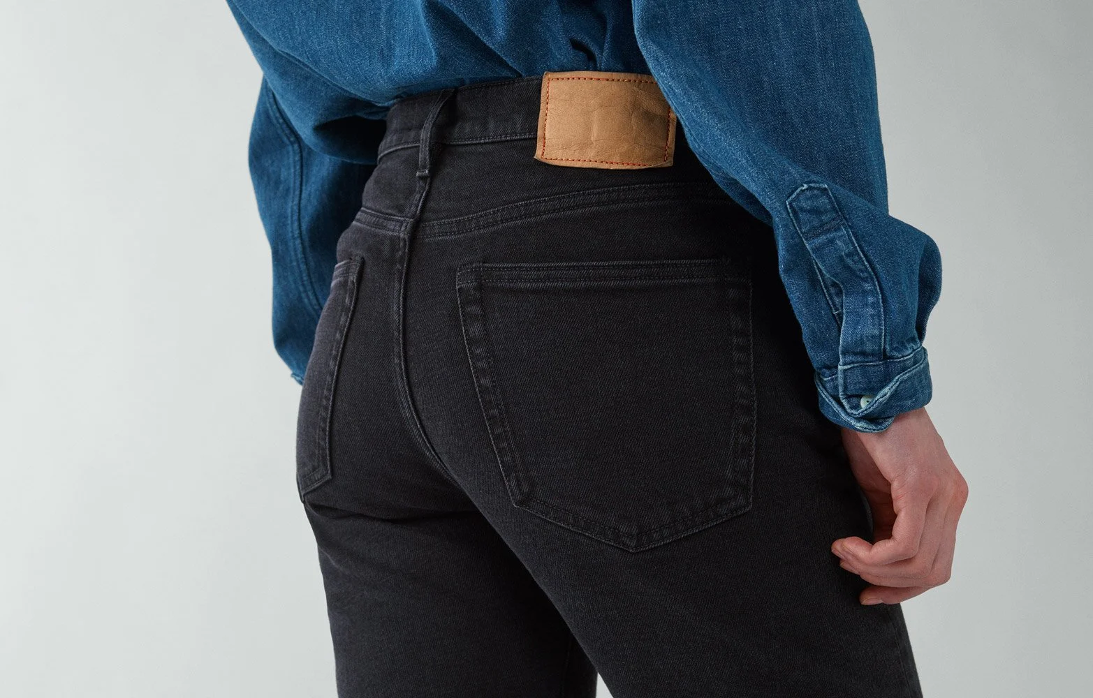 Jeanerica black jeans worn by model