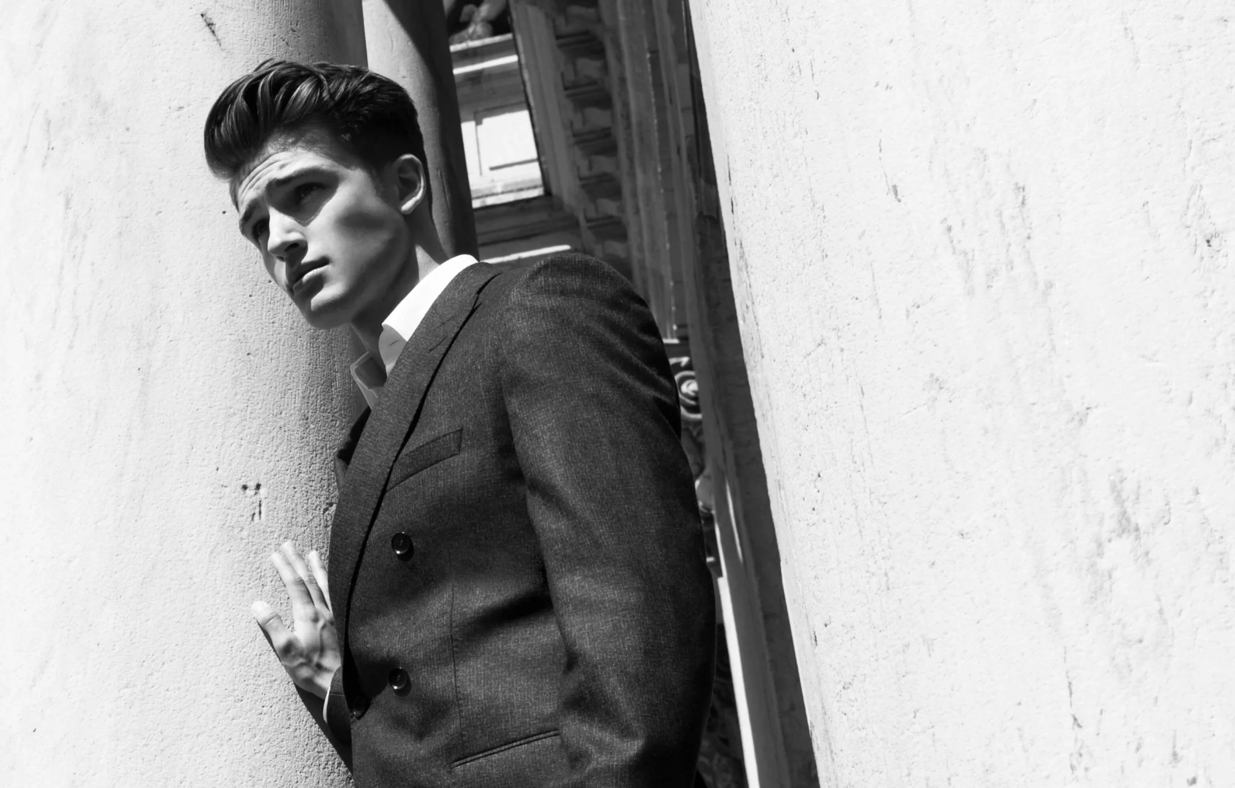 Hugo Boss double-breasted dark suit worn by model