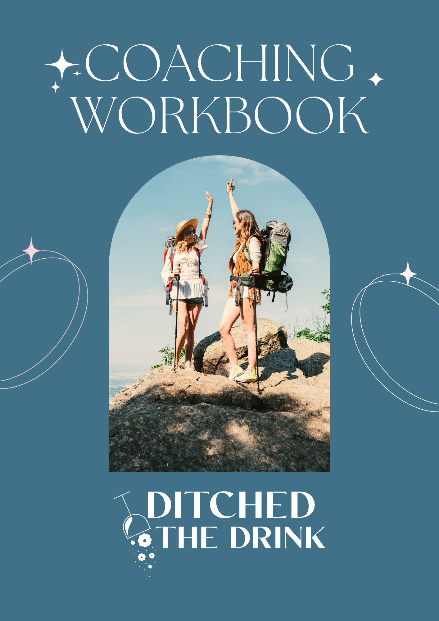 Two women with backpacks high-fiving on a rocky outcrop on a sunny day. They are smiling and dressed for hiking.