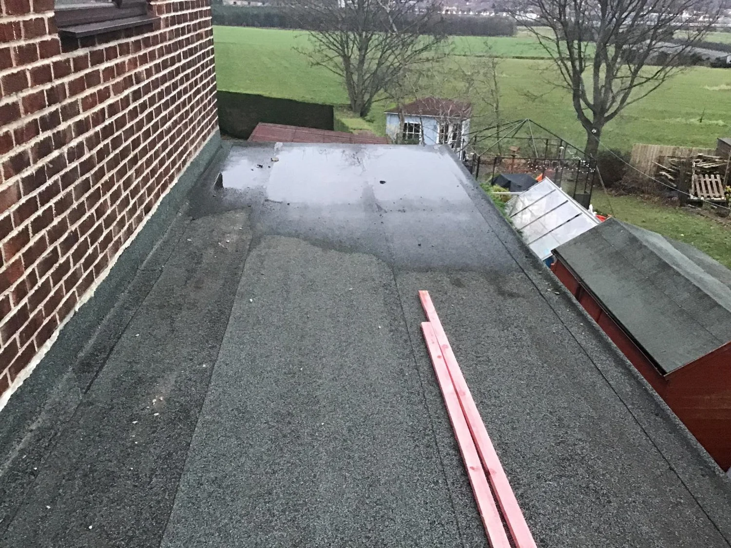Garage roof before re-felting work started in Fawdon, Newcastle