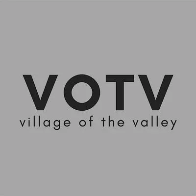 VOTV logo with the text "village of the valley" underneath