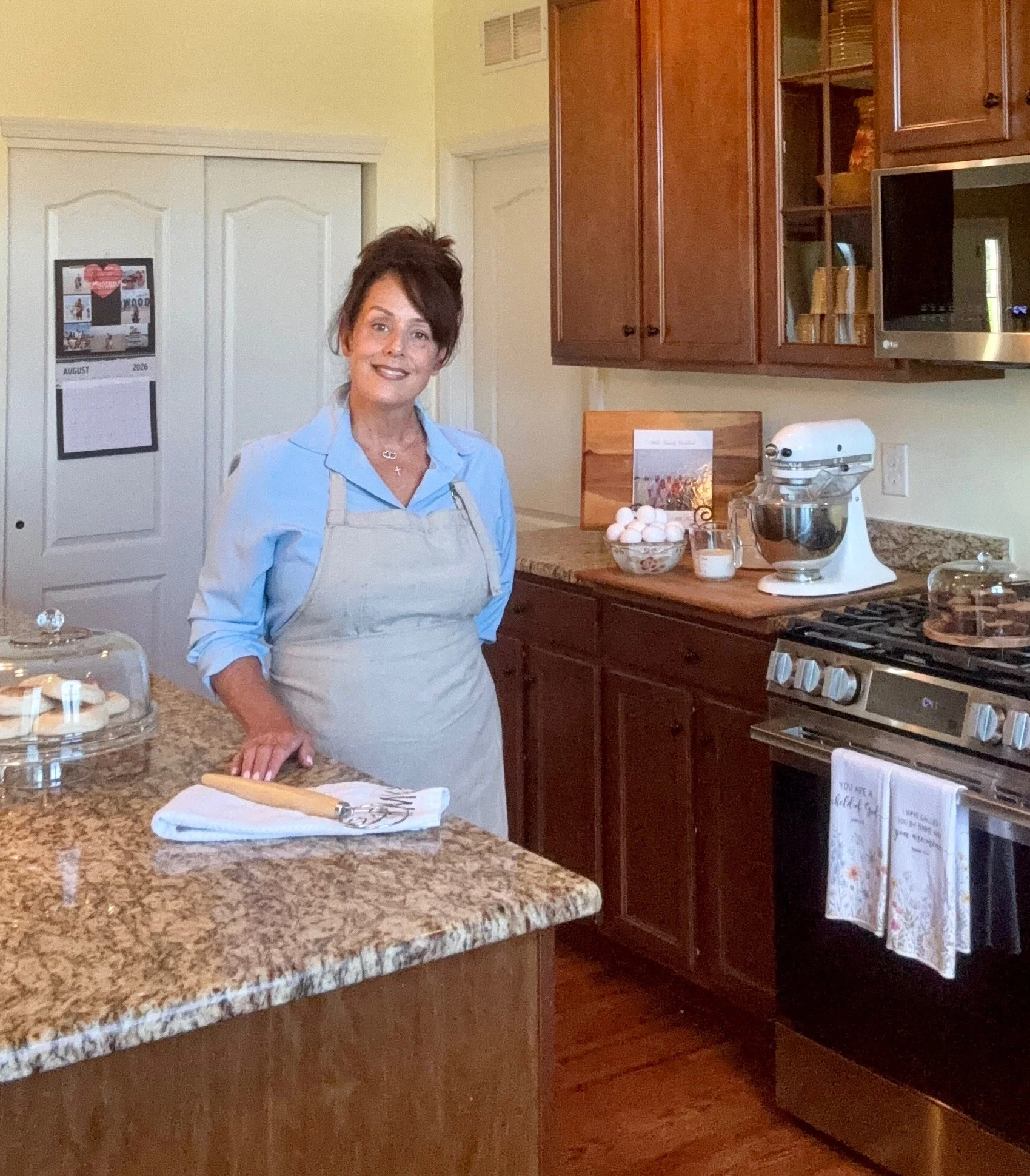 Gigi in her home bakery kitchen preparing fresh baked goods.