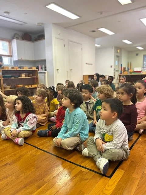 Claudia Colonna, author of children's book "Bajette's Ballon" pictured reading to children during her Magic of Smiles book tour.