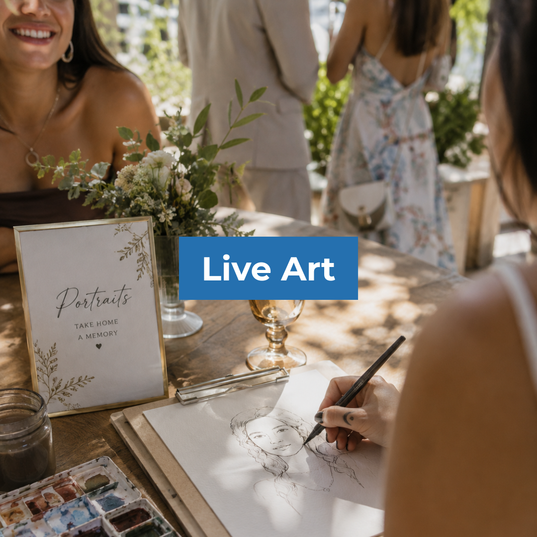 Live art portrait artist sketching a guest at an outdoor event table with flowers and watercolor paints