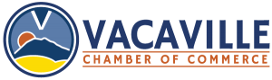 Logo of Vacaville Chamber of Commerce featuring a stylized sun, mountain, and sky in a circular design with text