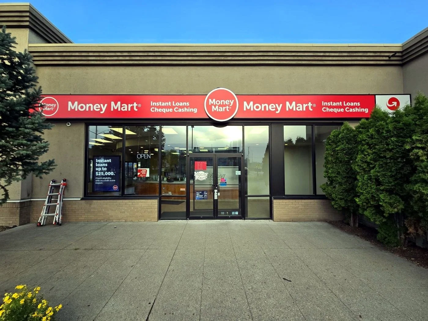 Money Mart storefront fascia signs installed by Supreme Signs