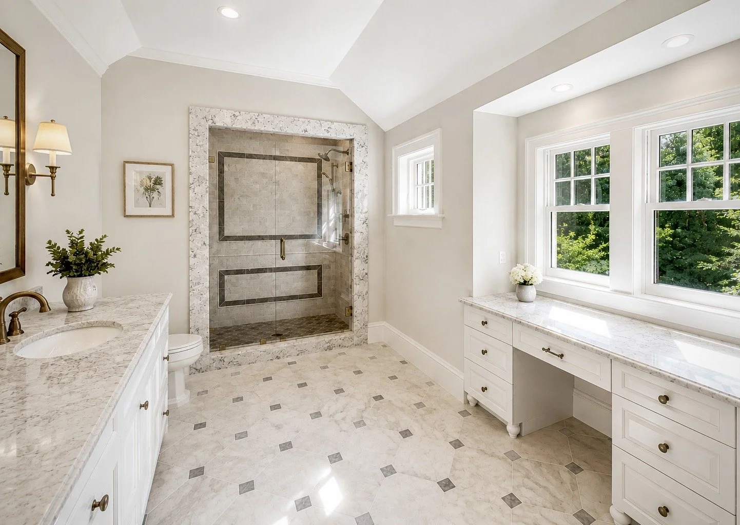Bright bathroom with a double vanity, marble countertops, and a large walk-in shower with glass door and tiled interior. Three large windows let in natural light, and the floor has patterned tile.