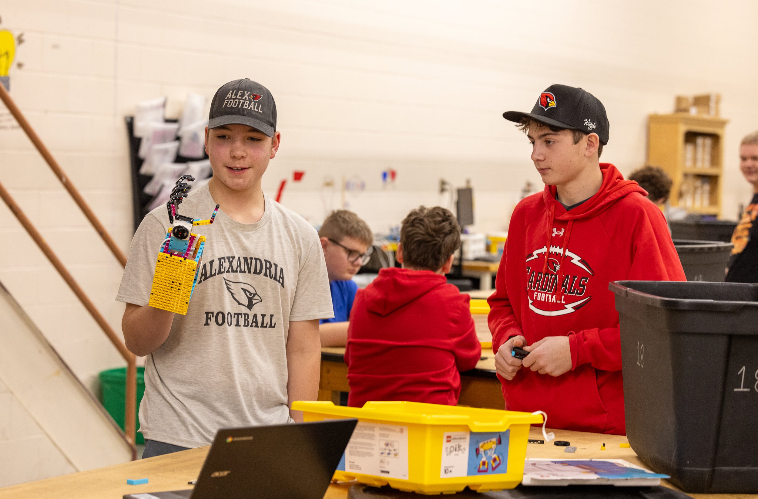 Students doing a robotic experiment