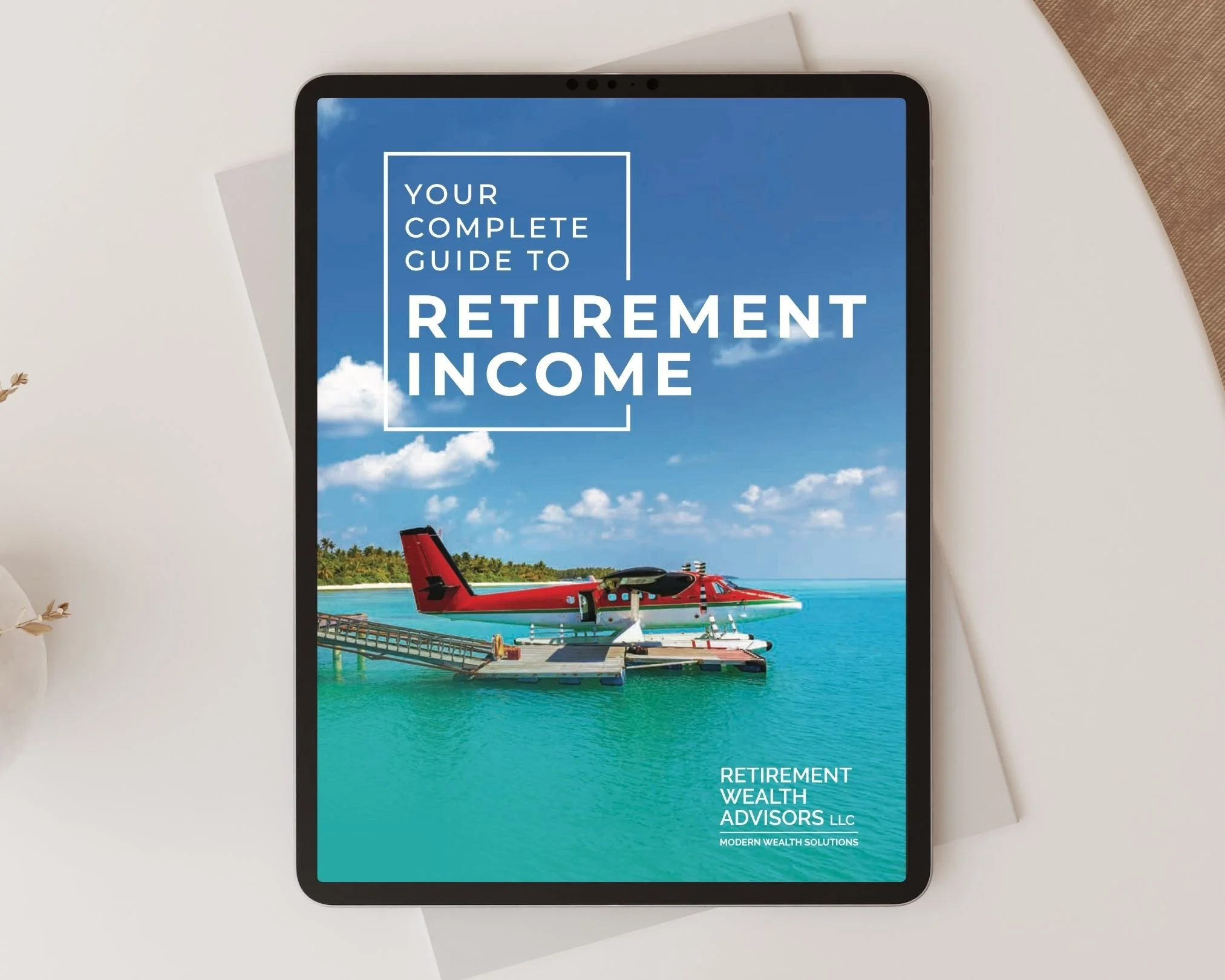 Brochure titled "Your Complete Guide to Retirement Income" with an image of a red helicopter parked at a dock on clear water, under a partly cloudy sky.