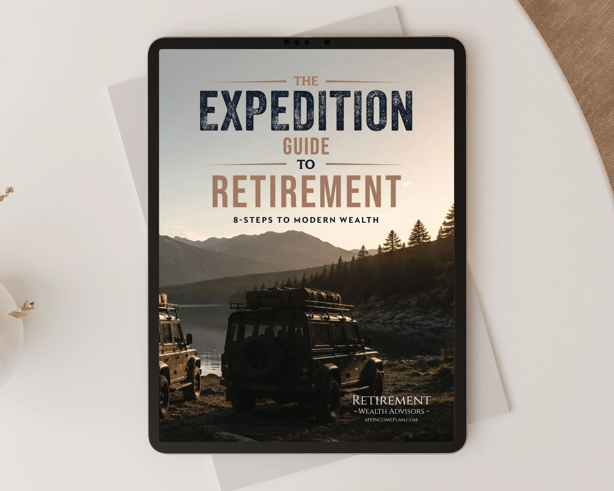 A digital magazine cover about retirement planning featuring a landscape with mountains, trees, and parked jeeps by a lake, with text indicating a guide to retirement and wealth management.