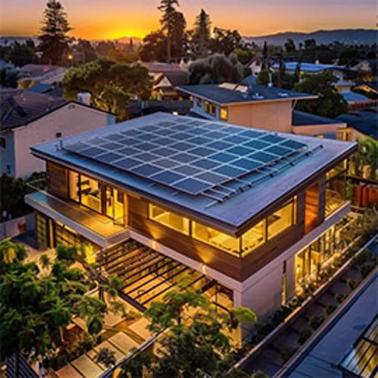 A modern house with solar panels on the roof, surrounded by trees, during sunset in a residential neighborhood.