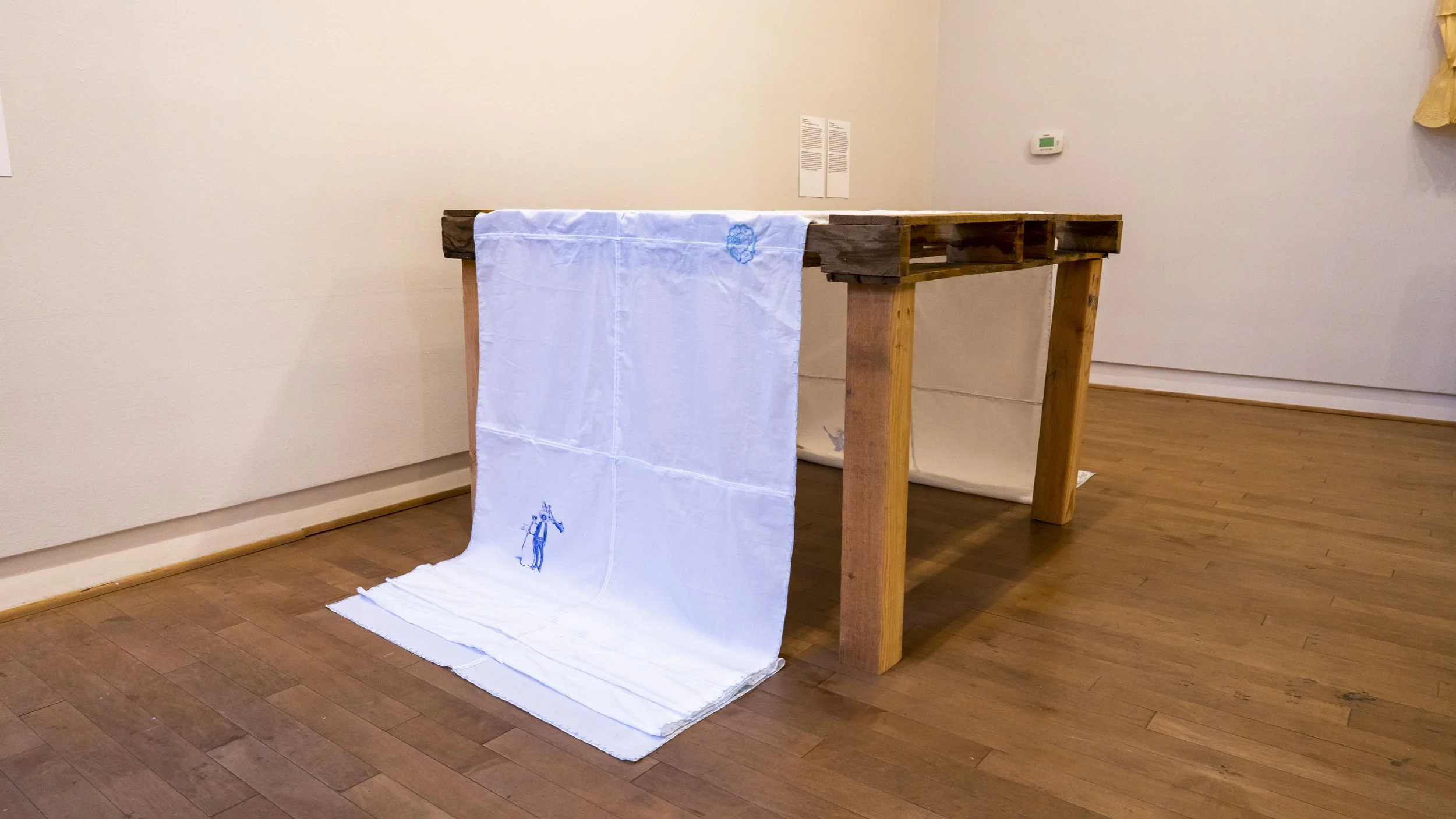 Obrere Internacional, 2022, Textile: 19 x 3.6 feet Table: 4 x 3.3 x 2.3 feet.
Exhibited at the Mexicali Biennial at the Santa Cruz Museum of Art and History (September 1 - December 31, 2022)