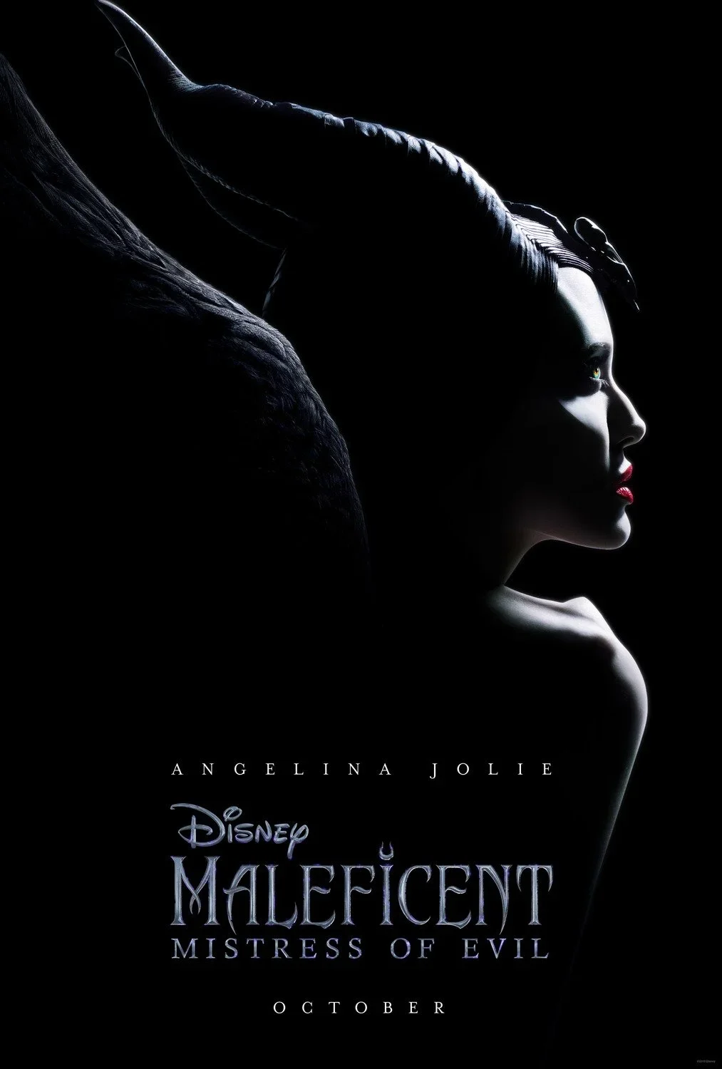 Close-up of Maleficent’s face in profile, with dark horns and makeup, promoting the movie 'Maleficent: Mistress of Evil' with Angelina Jolie, October release.