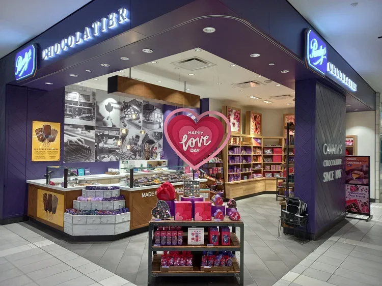 891+Valentines+-+Please+crop+in+on+table+display+and+hanging+sign+with+some+visible+storefront+around+edges.webp
