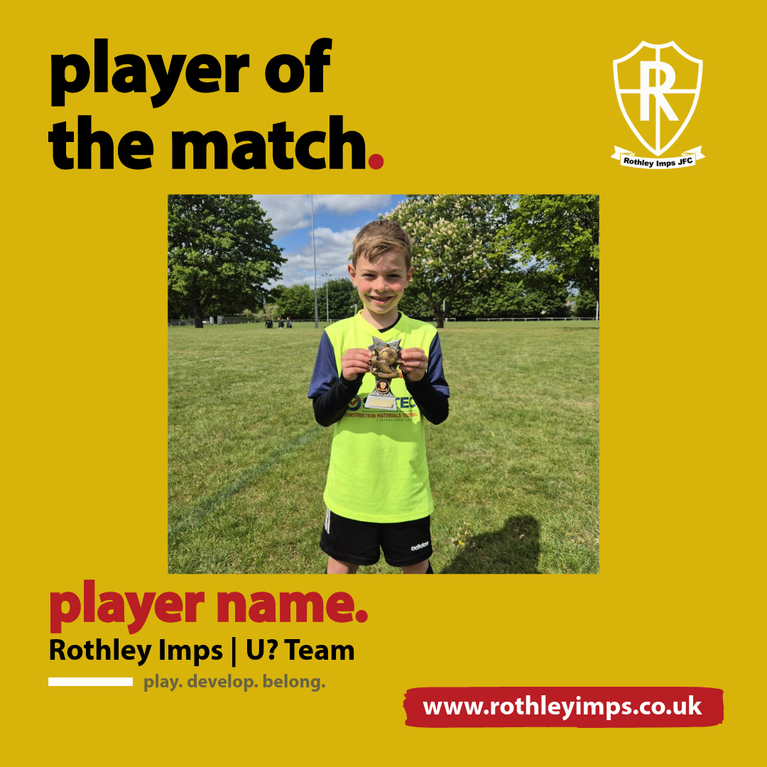 A young boy in a bright yellow and navy sports jersey, standing outdoors on a grassy field with trees and a partly cloudy sky in the background, holding a trophy and smiling.